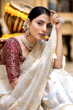 White Kanjivaram Banarasi Silk Saree with Rich Zari Weaving & Jacquard Blouse