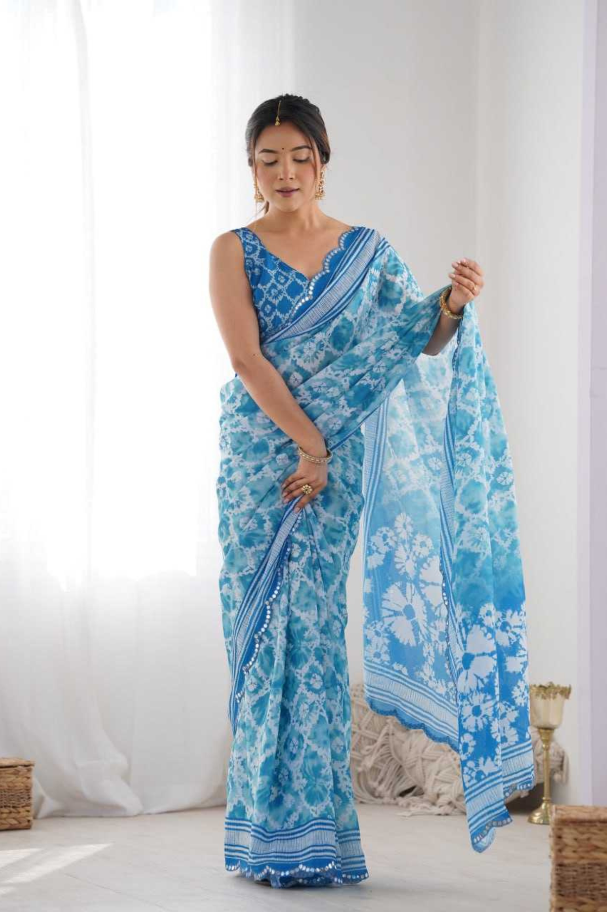 Sky Blue Floral Heavy Chinnon Saree with Mirror Lace Border