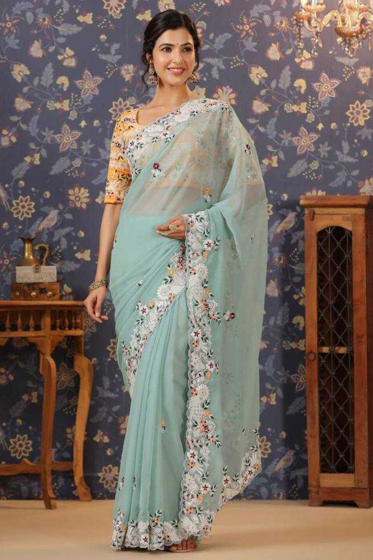 Aqua Blue Fox Georgette Saree with C-Pallu Embroidery & Cutwork Border