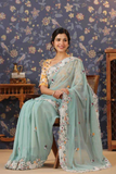 Aqua Blue Fox Georgette Saree with C-Pallu Embroidery & Cutwork Border