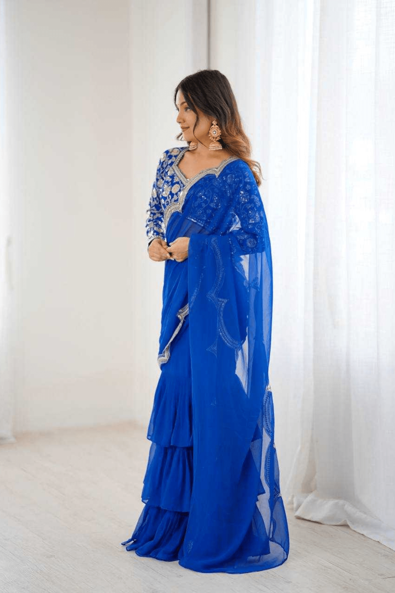 Azure Bloom Faux Georgette Ruffle Saree with Embroidered Blouse - kavyo.in