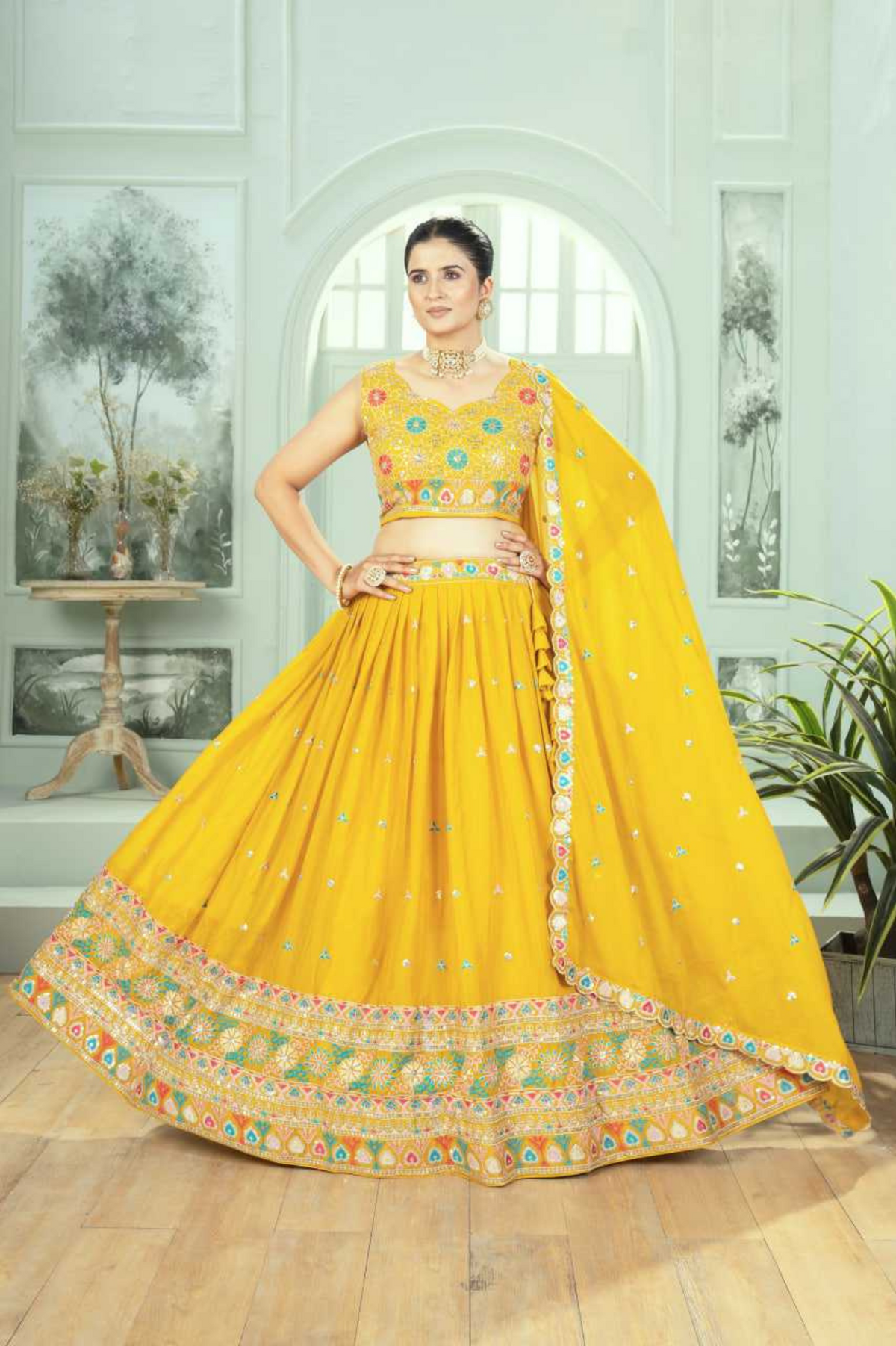 Embroidered Star Georgette Yellow Lehenga Choli with Dupatta