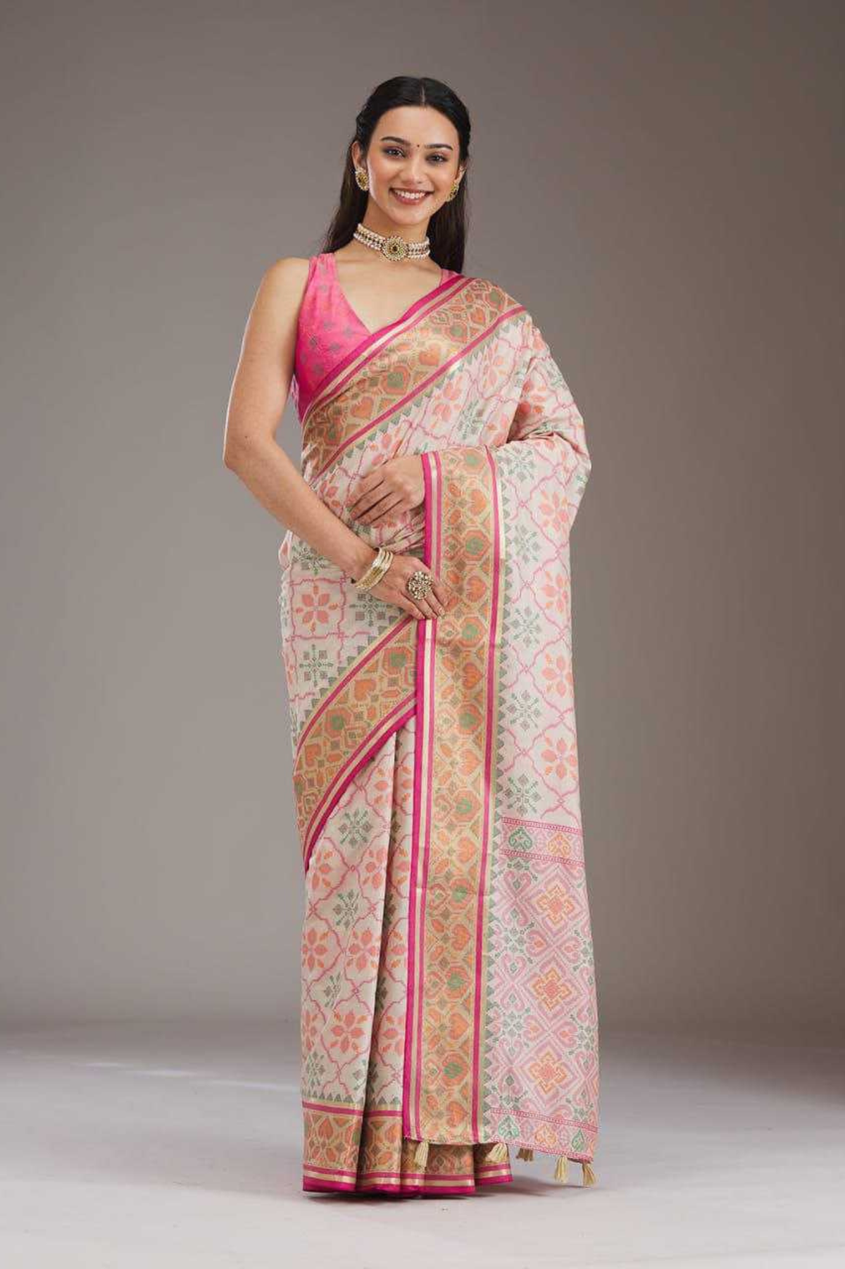 Elegant Banarasi Silk Saree with Patola Border Detailing