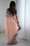Peach Net Party Wear Saree with Embroidered Border Lace