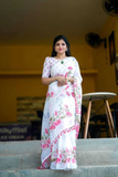 Elegant White Linen Saree with Floral Digital Print & Tassel Detailing