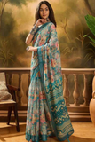 Blue Linen Cotton Saree with Watercolor Floral Print & Contrast Woven Border