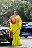 Neon Yellow Georgette Saree with Pink Lace Border & Tassels