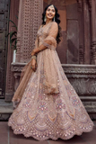 Adorned Biege Net Sequins & Thread Embroidered Bridal Lehenga Set