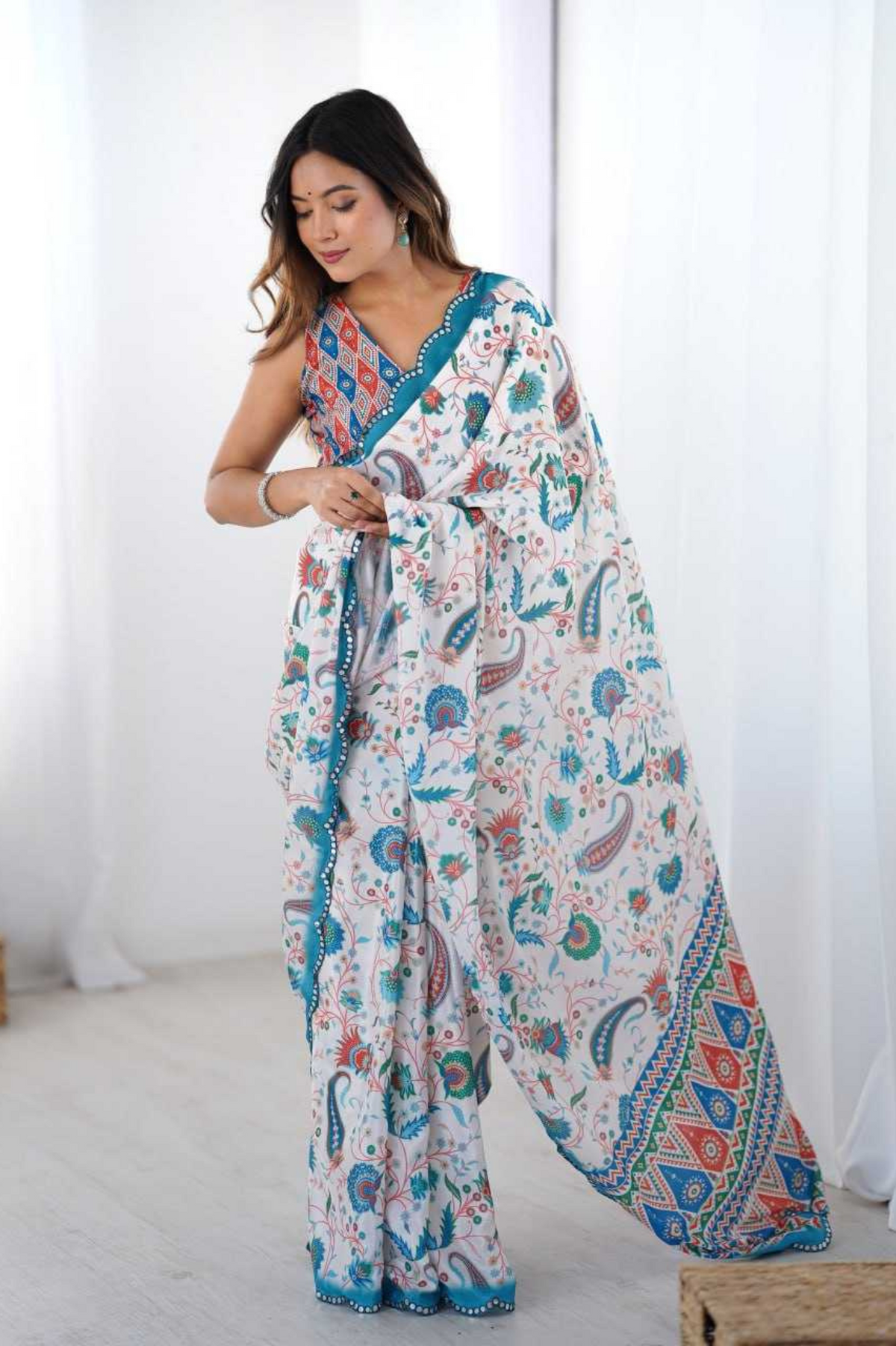 Elegant White Chinnon Saree with Kutchi Mirror Work