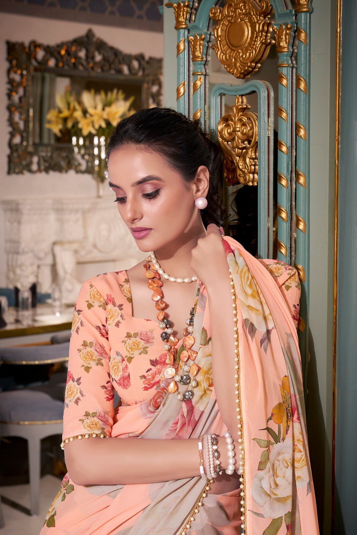 Peach Georgette Printed Saree with Pearl Lace Border